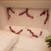 Faith, Hope and Love are conveyed through this lovely rose casket rosary.