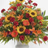 Sunflowers, red roses, red carnations lush mixed greens orange Lillie&rsquo;s , orange