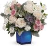Soft as a whisper, this enchanting bouquet of cream and pink roses