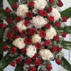 Spray with red roses and white hydrangeas.
