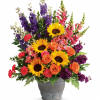 A colorful reminder that brighter days are ahead, this uplifting arrangement of