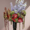 In this symphony of colors and textures, the tall and beautiful arrangement