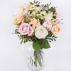 Delicate and enchanting, this bouquet of soft roses is the epitome of