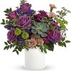 This neutral matte white keepsake lends an organic feel to this extraordinary