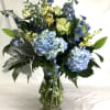Blue Hydrangeas, White Lilies, Delphinium and Snapdragons in a Tall Vase