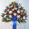 Gorgeous asiatic lilies, white chrysanthemums, red roses, red carnations, and blue delphinium