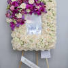 This frame includes roses and seasonal lavender and purples florals. The standard