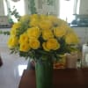 A bouquet of fresh, radiant , 18+yellow roses is a timeless gift.