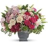 This grand arrangement features dark pink hydrangea, pink cymbidium orchid blossoms, cr&egrave;me