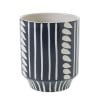 Lush mound of seasonal floral and greenery in our ZIVA POT. 
Vase