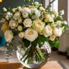 Create a breathtaking arrangement with white roses and Lisianthus in a transparent