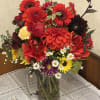 An artistic and strong bright red color arrangement is a pleaser and