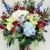 Seasonal blooms in patriotic  colors reflecting the pride and joy of