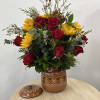 &ldquo;Encanto De Barro&rdquo; charming arrangement of red roses, vibrant, sunflowers, and lush