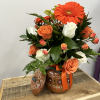 A striking clay or arrangement featuring a vivid mix of white and