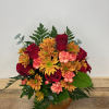 Harvest Glow Arrangement brings a romantic and radiant touch to any space.