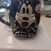 Halloween mug can be used a a base for a floral arrangement