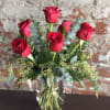 1/2 Dozen Red Roses beautifully arranged and always in style.