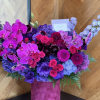 Gorgeous box with hot pink flowers and orchids