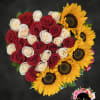 Elegant heart arrangement with red and white roses, accompanied by radiant sunflowers.