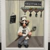 A completely hand made, molded clay, painted on a 9.5&rdquo;x11.5&rdquo; wooden frame.