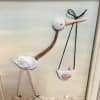 A unique one of a kind Stork with baby hand sculpted and