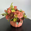 Celebrate the warmth of autumn with our pumpkin bouquet, featuring vibrant bloom