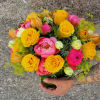 Delight Mom with a vibrant floral arrangement featuring the timeless elegance of