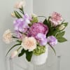 A sophisticated floral ensemble designed to elevate any occasion, featuring exquisite peonies