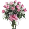 12 pink roses with baby&#039;s breath in clear vase