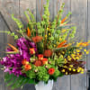This wild and fabulous tropical inspired arrangement includes Bells Of Ireland, Makara