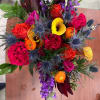 The Wild Elegance Arrangement is a striking blend of bold textures and