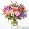 

Put your best foot forward with this regal arrangement of pinks, purple