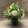Smooth and silky, this arrangement blends blooms of white, ivory, and yellow