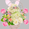 This Easter Bunny arrangement with colorful decorative eggs. Easter Bunny is wearing