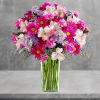 The perfect pick for a cheerful celebration! This cheerful blooms arrangement will
