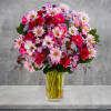 The perfect pick for a cheerful celebration! This cheerful blooms arrangement will