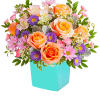 This floral arrangement features the sweetest shades of spring in one whimsical