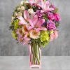 A lovely surprise no matter the occasion, this gorgeous blend of hydrangea