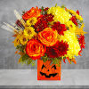 Happy Yellow-een! Yellow chrysanthemums are accented with bright orange roses -all finished