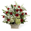 Beautiful red and white colored basket with mixed flowers.