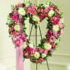 Pink and White Hollow Heart made with Carnations, Roses, Mums, Carnations and