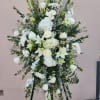 A sympathy all white flowers. 