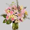 A perfectly pleasing mix of sweet feminine blossoms make this a truly