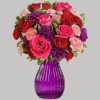 Passionately pink! This arrangement boasts hot pink roses and dark red spray