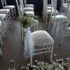 Popular, inexpensive perfect wedding touch to a pew decor: baby&#039;s beath bouquets
