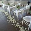 Popular, inexpensive perfect wedding touch to a pew decor: baby&#039;s beath bouquets