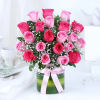 This trendy, high-fashion mix of hot pink roses, and pink roses, is