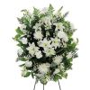 White mums, carnations, Monte Casino blooms, and snapdragons on a self-standing easel