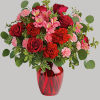 Tres belle! Ruby red roses and delicate pink alstroemeria are mixed with